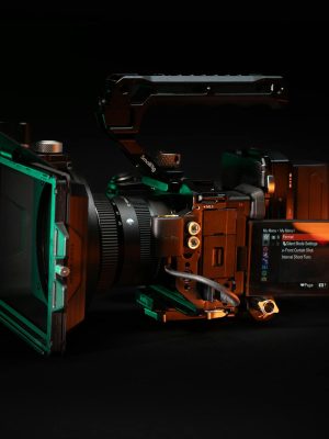 High-quality video camera rig featuring lens and display screen, ideal for filmmaking and studio work.