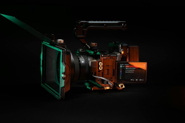 High-quality video camera rig featuring lens and display screen, ideal for filmmaking and studio work.