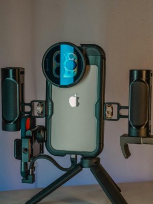 Innovative smartphone filmmaking rig setup, perfect for professional light and video capture indoors.