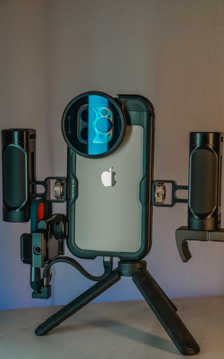 Innovative smartphone filmmaking rig setup, perfect for professional light and video capture indoors.
